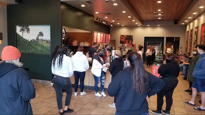A crowed interior scene at the local Starbucks 